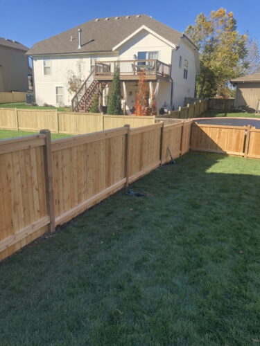 our fence projects copy of wooden fence side yard on hill1